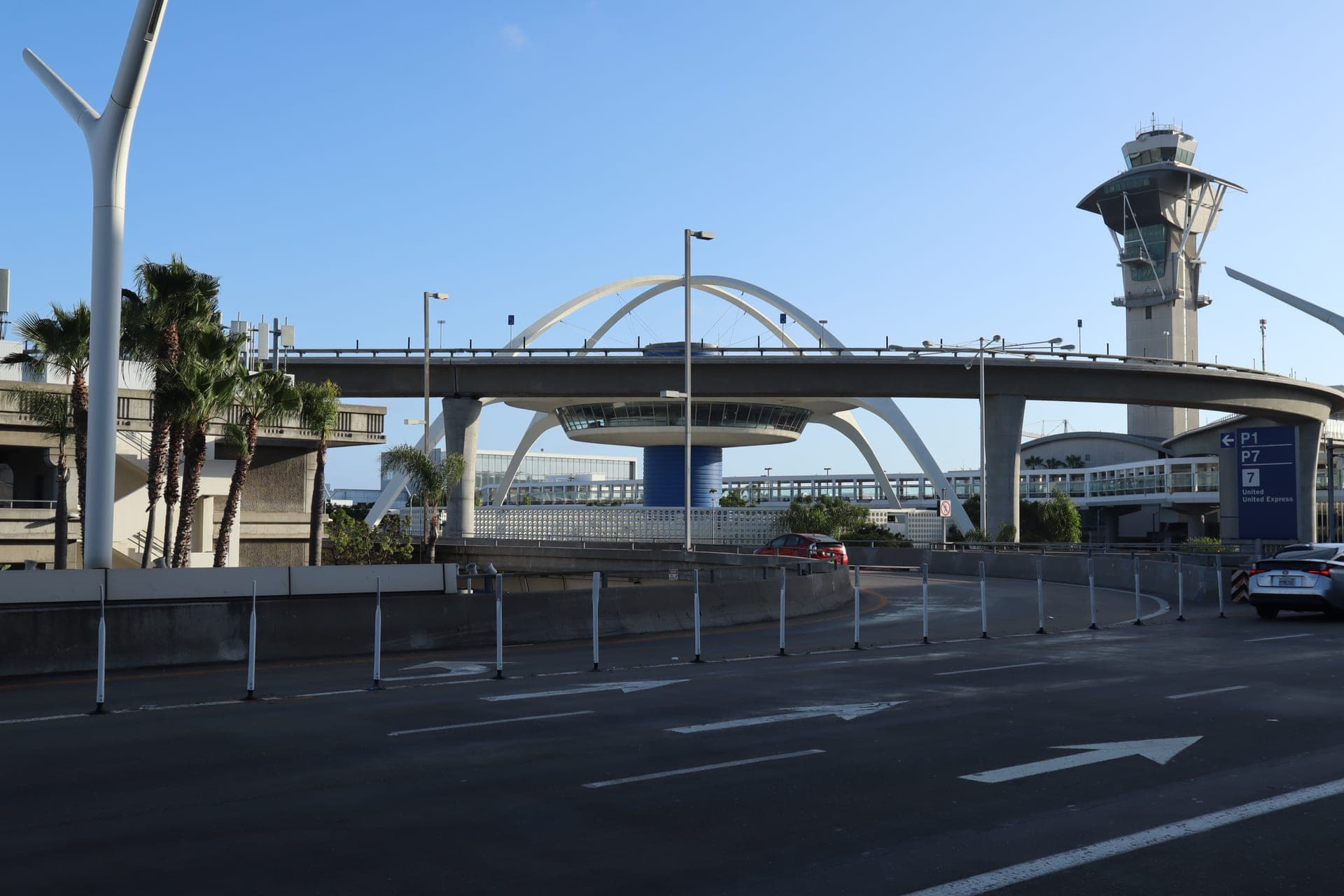 LAX Theme Building and control tower at Los Angeles International Airport — VIP City Rides private car service